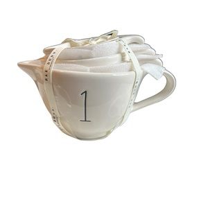 Rae Dunn Four-piece Measuring Set. Loop handle and easy pour spout. Adorable.